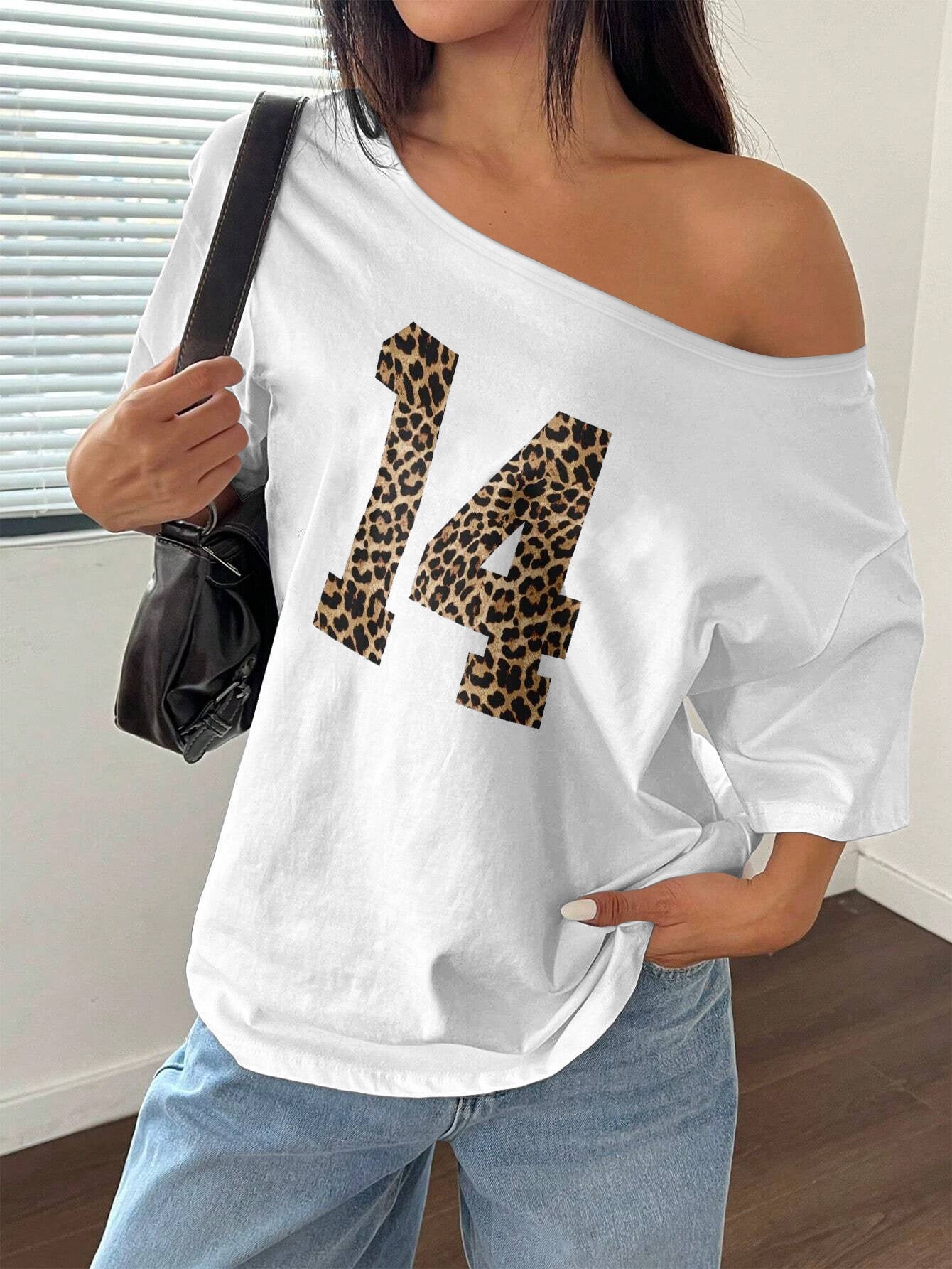 [Trendy Y2K Tee] Soft White Women's Y2K Off-Shoulder Leopard Print "14" Graphic Tee | Casual Loose Fit Spring/Summer Top, Polyester Blend, Machine Washable, Trendy Women's Apparel, Stretchable Fabric