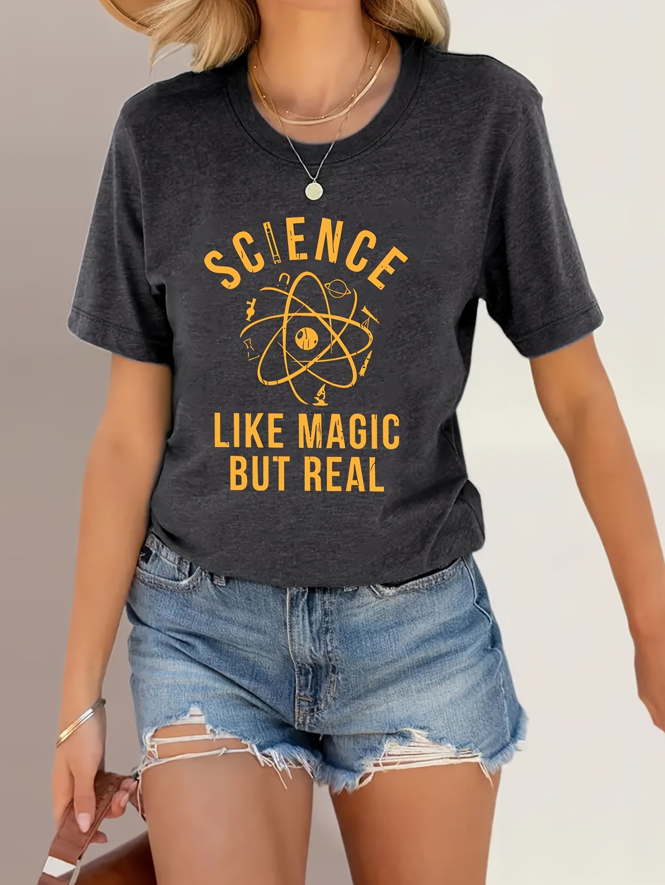 [Science Tee] Dark Grey Women's Science Print T-Shirt | Short Sleeve Crew Neck Casual Top | Machine Washable Summer & Spring Apparel, Science Shirt, Casual Attire, Playful Graphic Tee, Relaxed Fit Shirt - "Science Like Magic But Real" Atomic Graphic