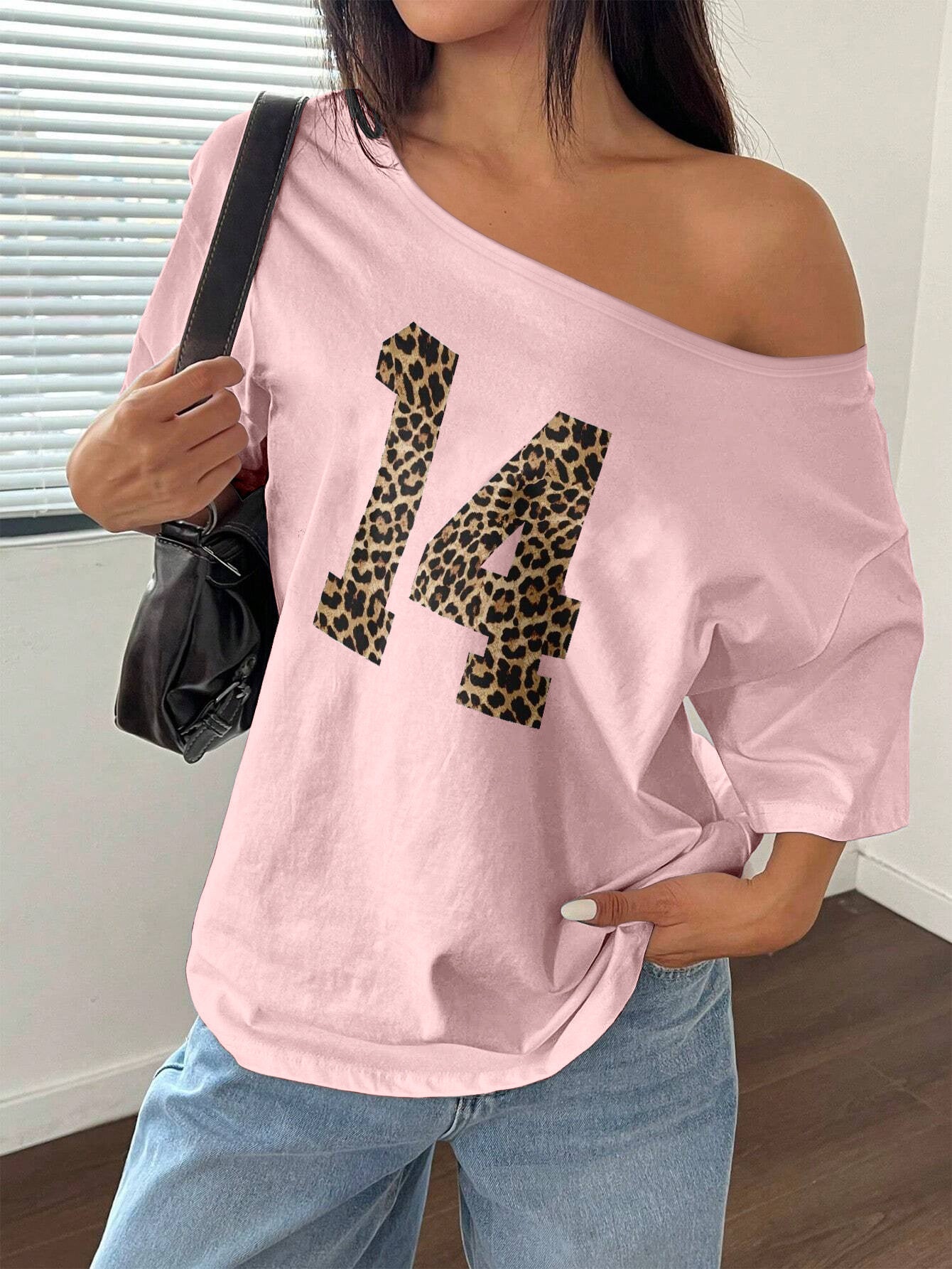 [Trendy Y2K Tee] Soft White Women's Y2K Off-Shoulder Leopard Print "14" Graphic Tee | Casual Loose Fit Spring/Summer Top, Polyester Blend, Machine Washable, Trendy Women's Apparel, Stretchable Fabric