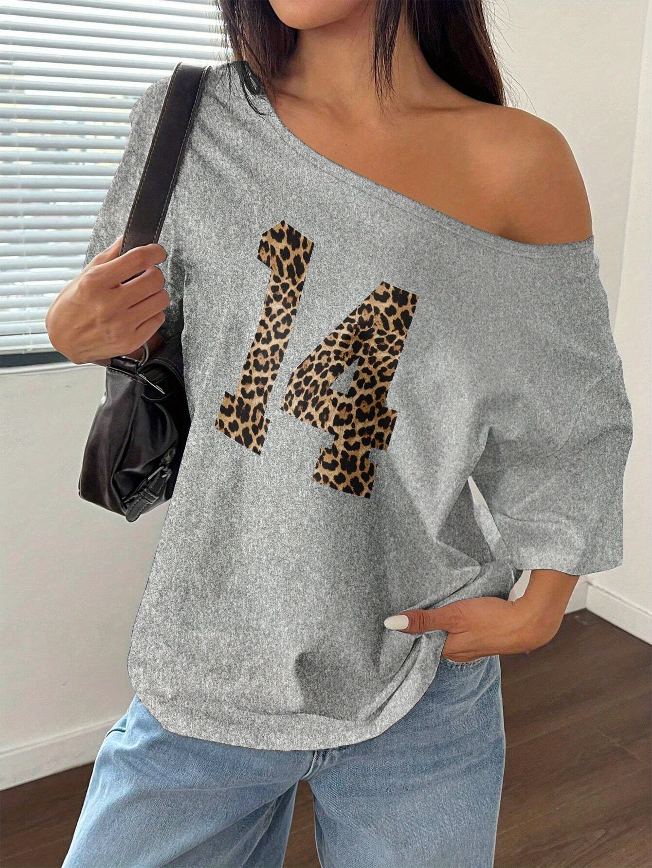[Trendy Y2K Tee] Soft White Women's Y2K Off-Shoulder Leopard Print "14" Graphic Tee | Casual Loose Fit Spring/Summer Top, Polyester Blend, Machine Washable, Trendy Women's Apparel, Stretchable Fabric